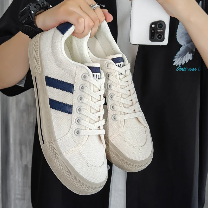 Men's canvas shoes with a branded logo on the side for brand recognition Men's canvas shoes in khaki color for a versatile lookMen Fashion Canvas Breathable Flat Casual Skate Shoes Men's canvas shoes with a branded logo on the side for brand recognition Men's canvas shoes in khaki color for a versatile lookMen Fashion Canvas Breathable Flat Casual Skate Shoes