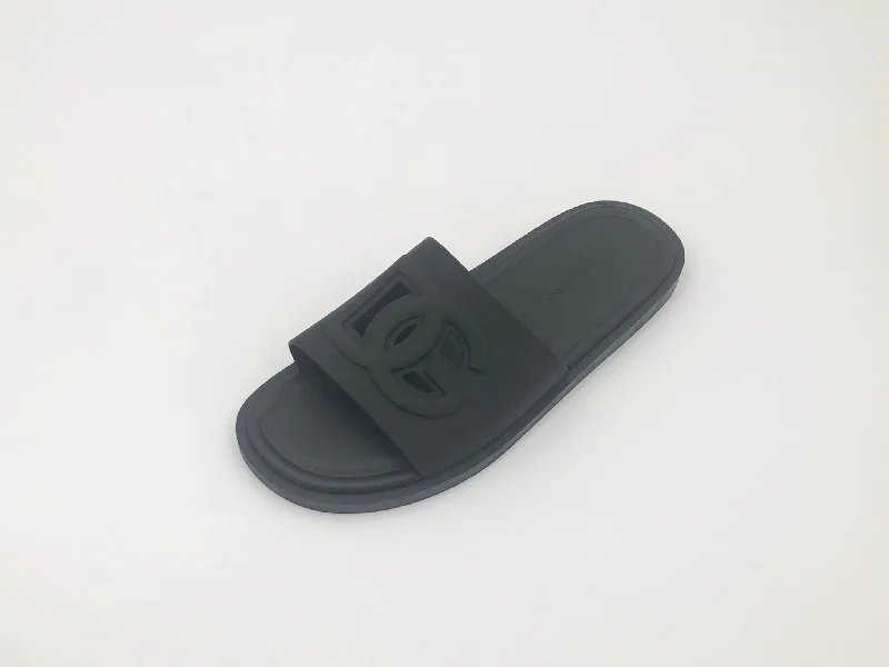 Men's sandals in a neutral color like black or brownDolce & Gabbana Black Tonal Cutout Logo Pool Slides