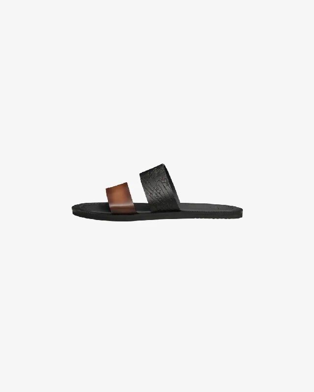 Leather men's slippers with a mule styleBerluti Debossed Venezia Leather Sandals - Brown.