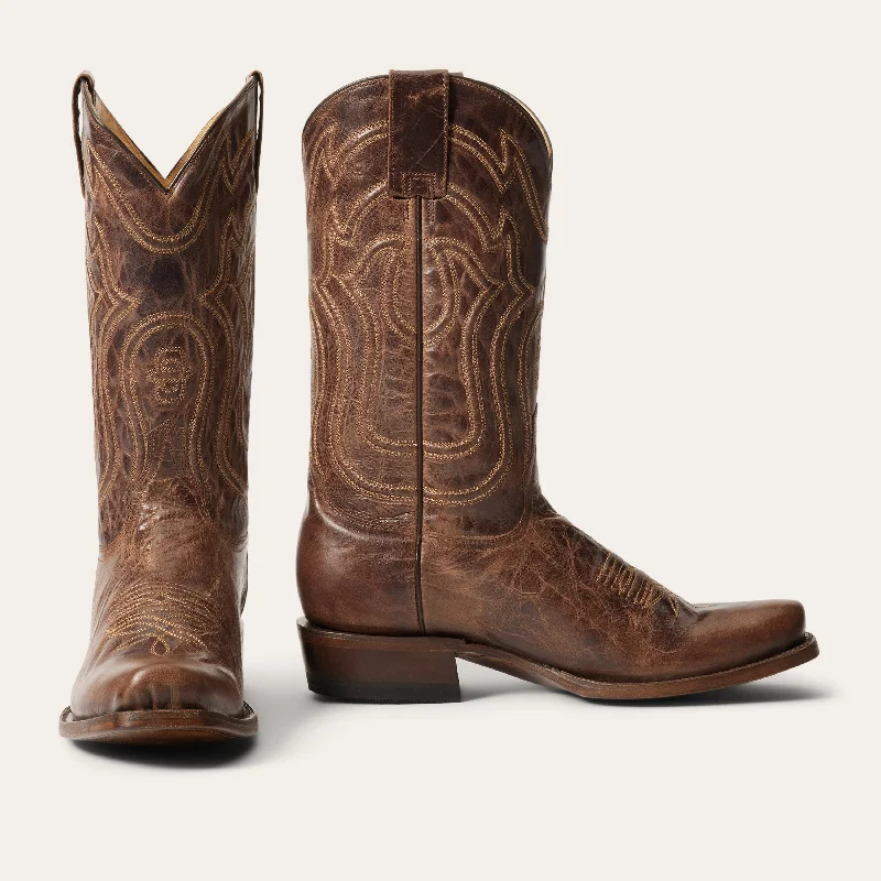 Men's western boots with a concho - studded strap and a pointed toeGarrett Boots