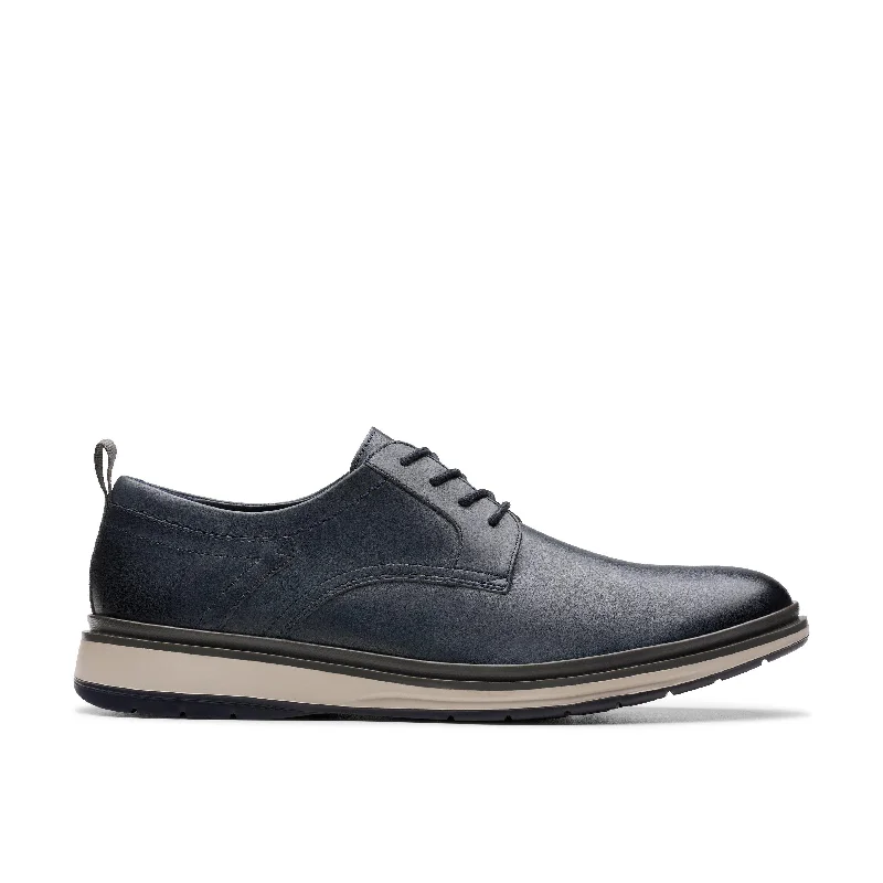 Men's formal shoes with a wingtip designClarks Chantry Lo in Blue Leather