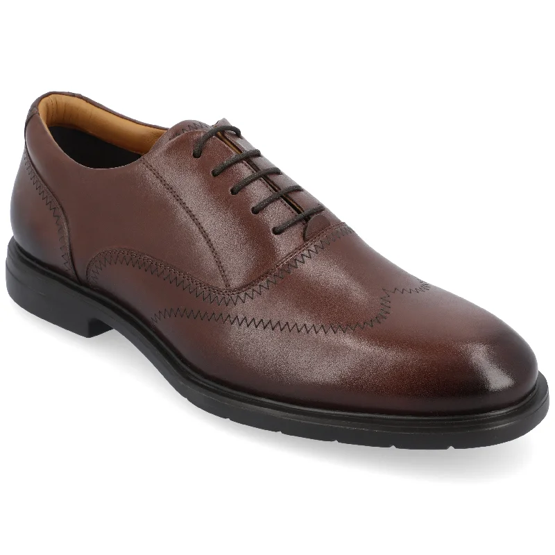 Men's formal shoes with a leather sole and heelThomas & Vine Hughes Wide Width Wingtip Oxford